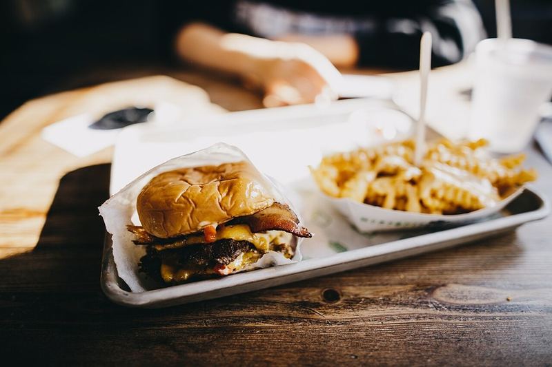 A real photo of a cheeseburger
